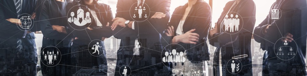 Group of business people standing with their arms crossed